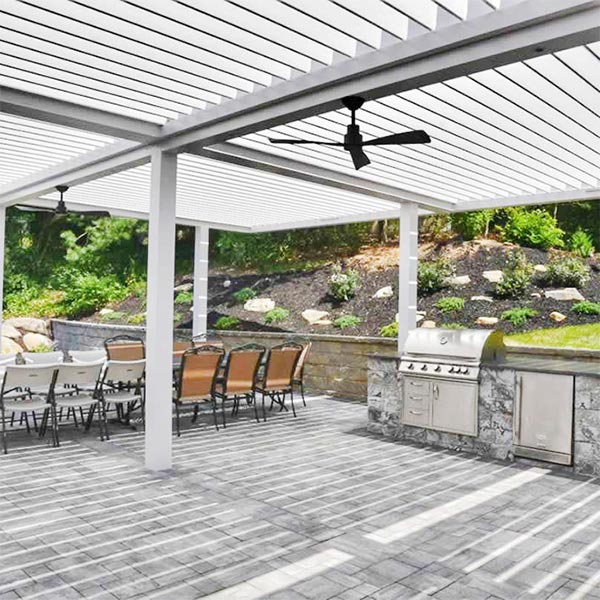 Outdoor dining space covered with motorized louvered pergola - Azenco Outdoor